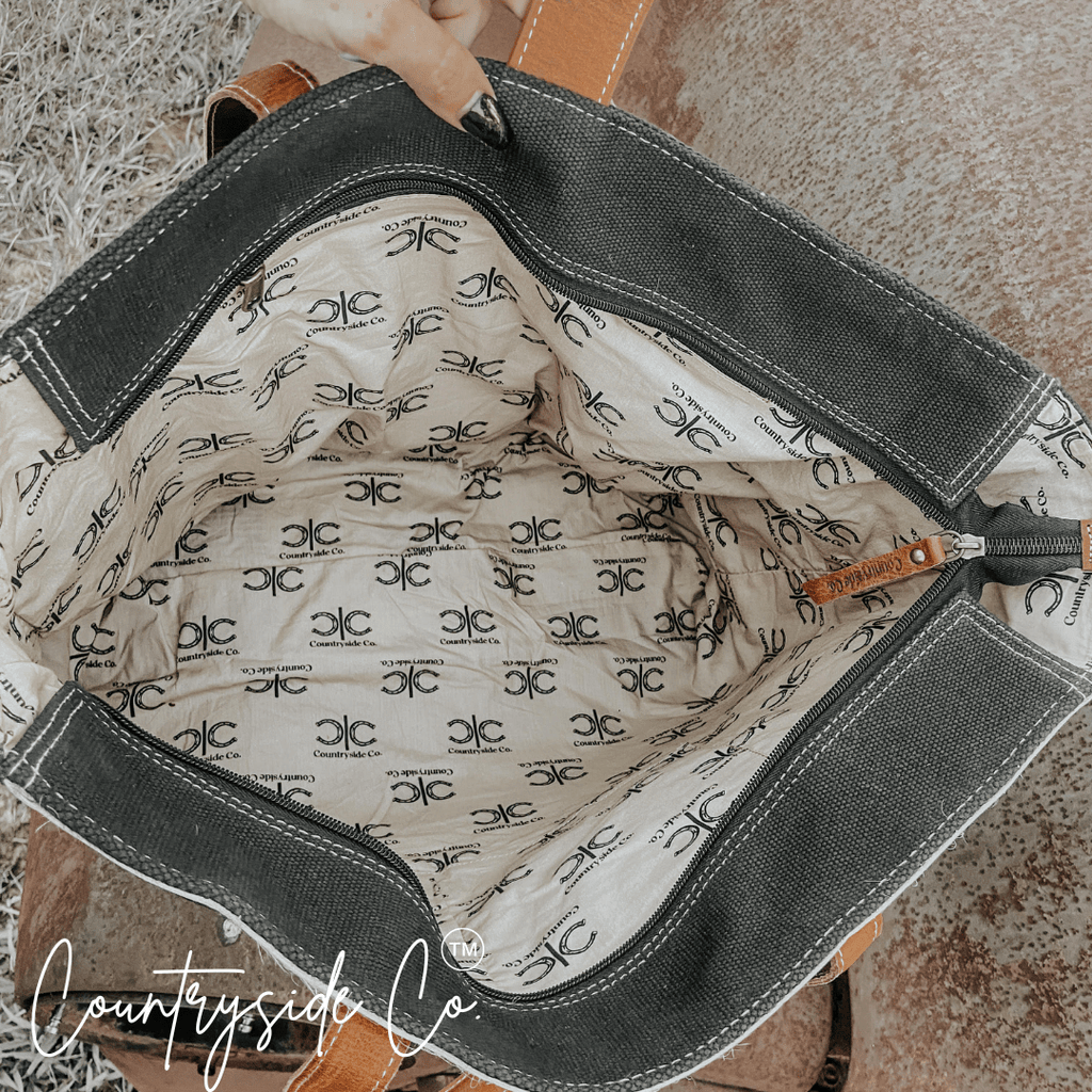 Darby Cowhide Carry All Overnight Bag - Rustic Avenue