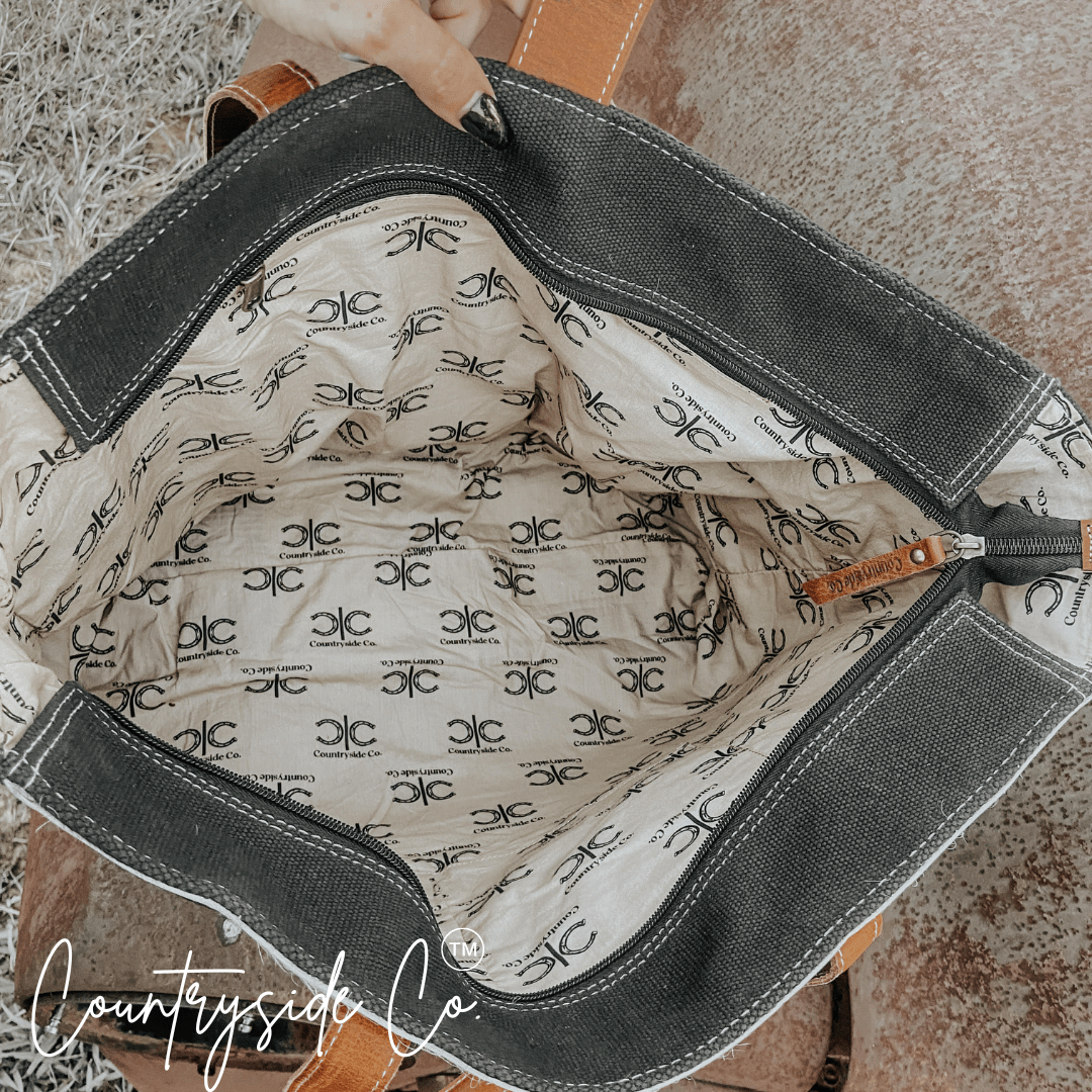 Darby Cowhide Carry All Overnight Bag - Rustic Avenue
