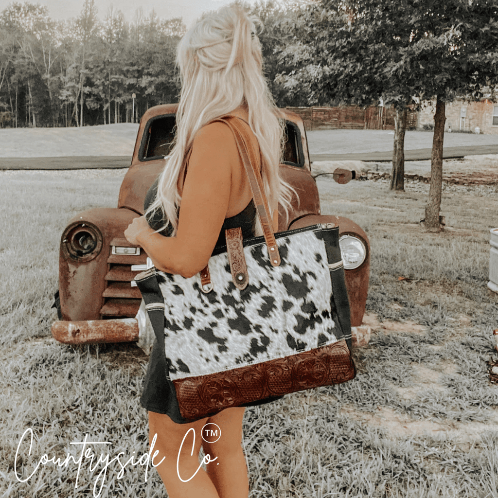 Darby Cowhide Carry All Overnight Bag - Rustic Avenue